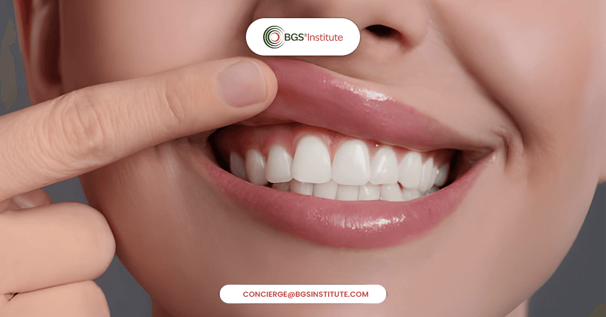 Woman showing healthy gums and teeth highlighting fast gum healing supported by improved gut health