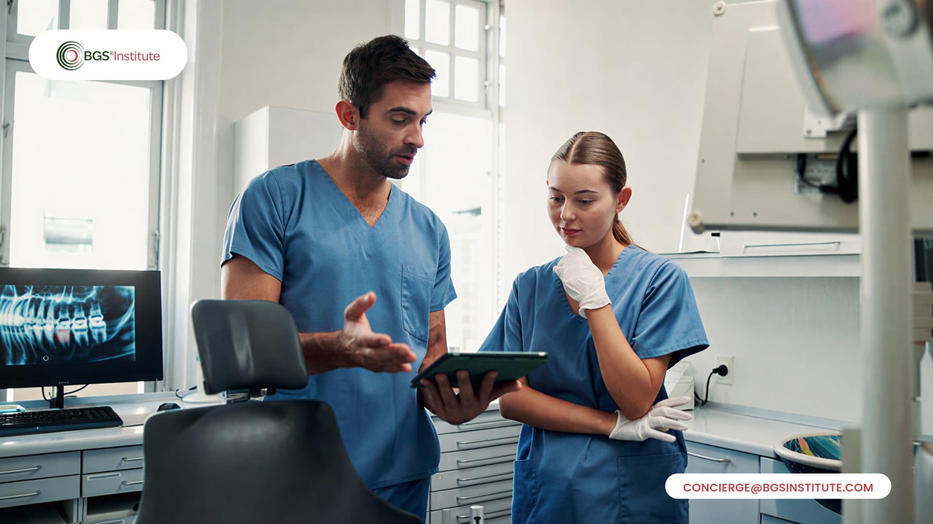 Dental professionals reviewing clinical research and patient imaging on a tablet in a modern dental practice