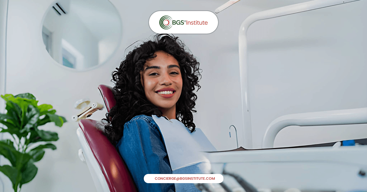 Patient smiling during Biological Dentistry treatment showing importance of oral health in modern dental care