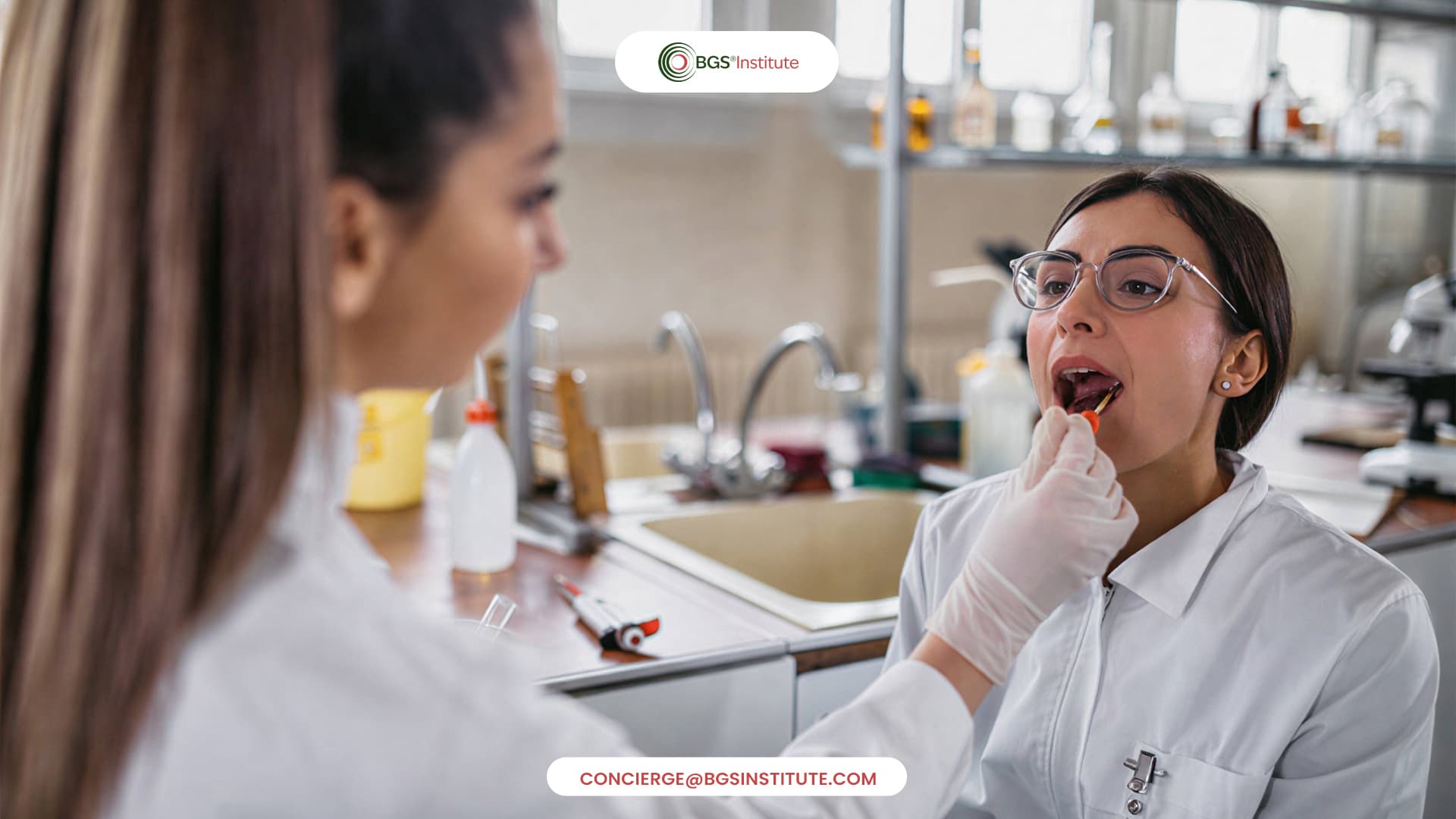 Clinician collecting an oral sample for saliva biomarker testing in a laboratory setting